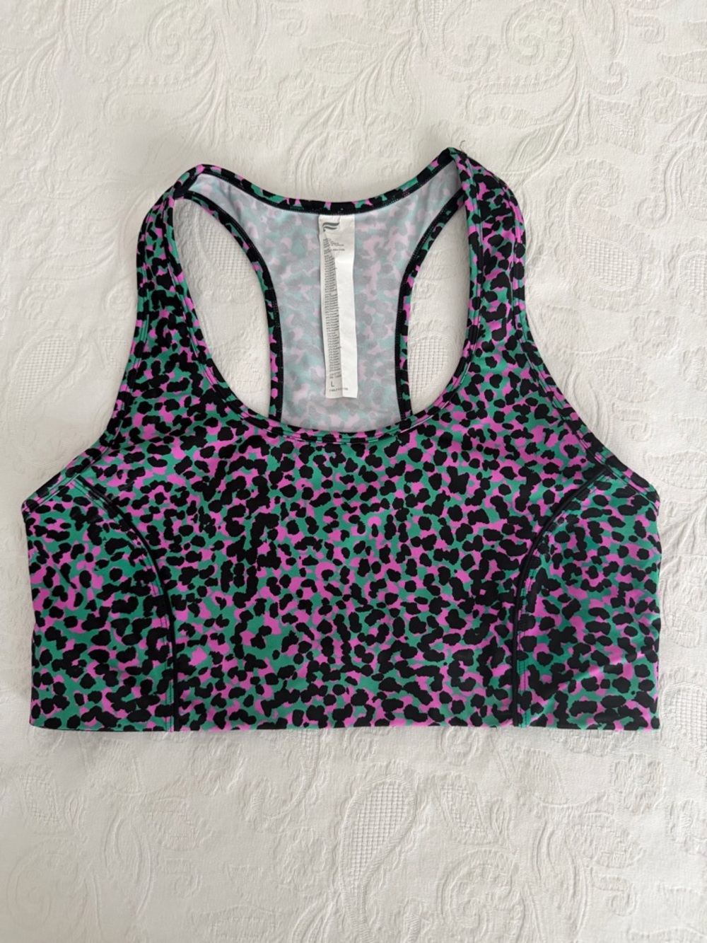 Fabletics Racerback Sports Bra in Green, Pink & Black Leopard